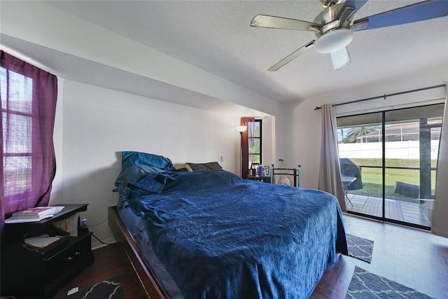 2751 S Cranberry Blvd, North Port, FL 34286 - bedroom featuring access to exterior, wood finished floors, and a ceiling fan