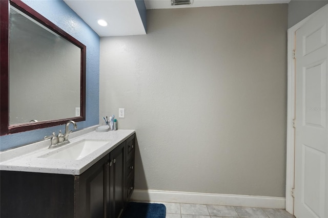 2751 S Cranberry Blvd, North Port, FL 34286 - bathroom featuring baseboards, vanity, and tile patterned flooring