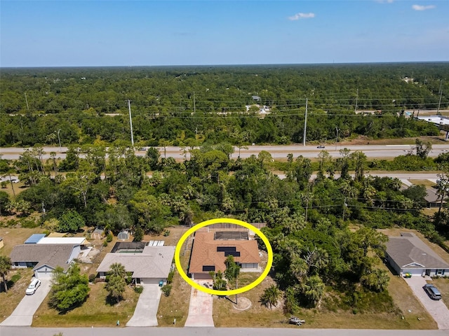 bird's eye view with a forest view