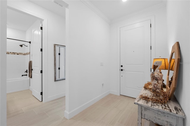 15830 Appalachian Dr, Punta Gorda, FL 33982 - hall with baseboards, ornamental molding, and visible vents