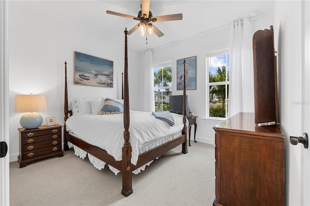 15830 Appalachian Dr, Punta Gorda, FL 33982 - bedroom with baseboards, a ceiling fan, and light colored carpet