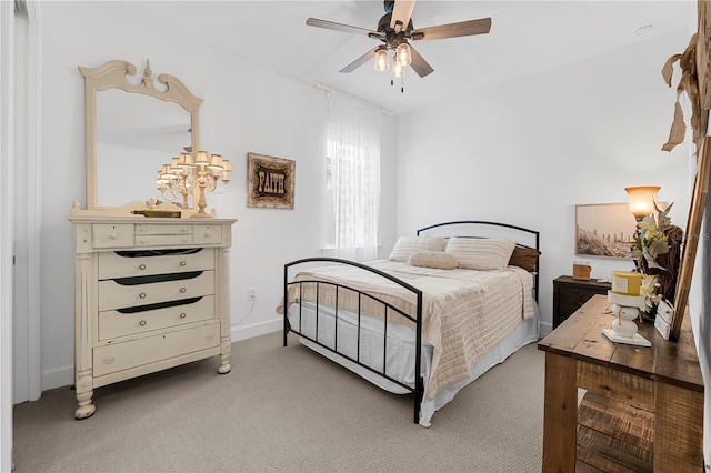 15830 Appalachian Dr, Punta Gorda, FL 33982 - bedroom featuring baseboards, a ceiling fan, and light colored carpet