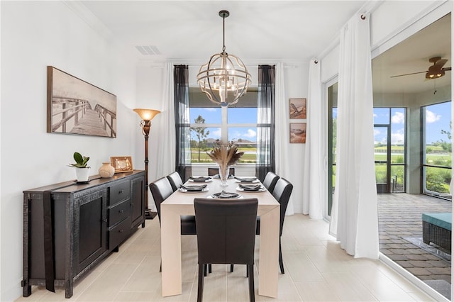 15830 Appalachian Dr, Punta Gorda, FL 33982 - dining area featuring light tile patterned flooring, visible vents, ornamental molding, and a wealth of natural light