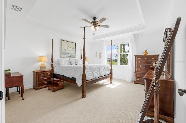 15830 Appalachian Dr, Punta Gorda, FL 33982 - bedroom featuring carpet flooring, a tray ceiling, visible vents, and baseboards