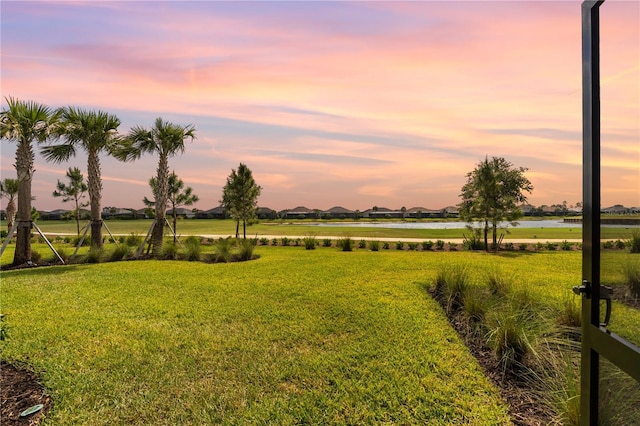 15830 Appalachian Dr, Punta Gorda, FL 33982 - yard at dusk featuring a water view