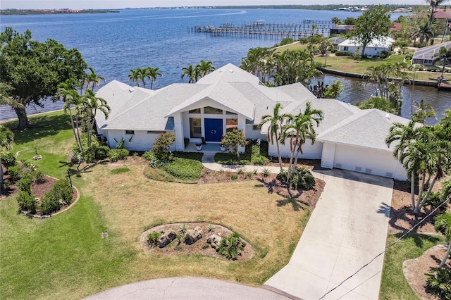 birds eye view of property featuring a water view