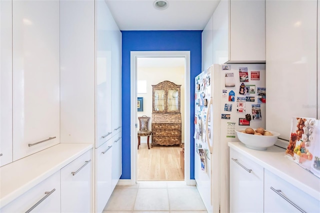 interior space featuring tile patterned flooring and vanity