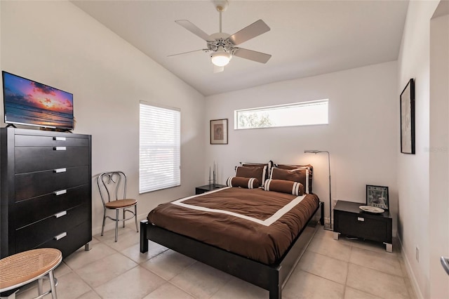 bedroom featuring baseboards, light tile patterned floors, ceiling fan, and lofted ceiling