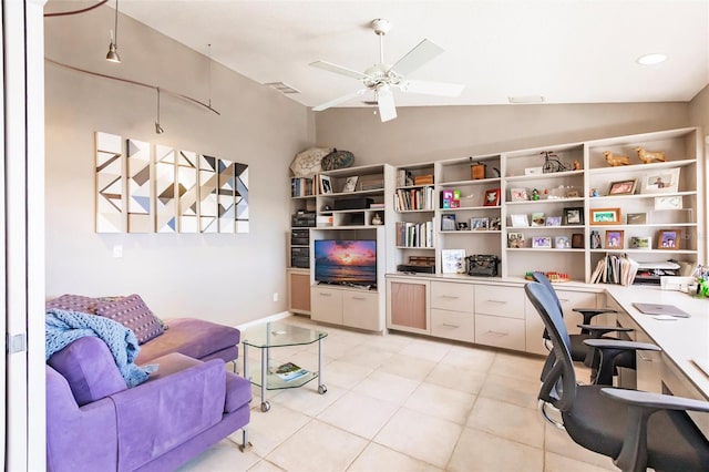 office area featuring visible vents, a ceiling fan, light tile patterned flooring, and lofted ceiling