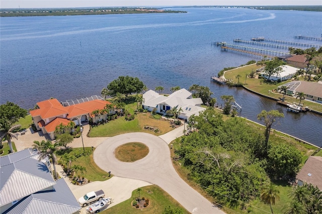bird's eye view with a residential view and a water view
