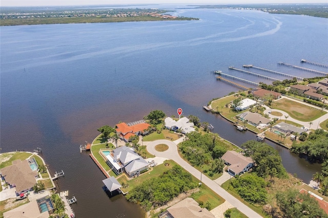 aerial view with a water view and a residential view