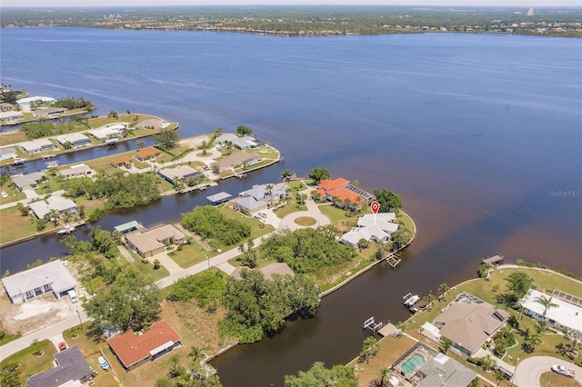 aerial view with a water view and a residential view