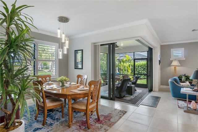 1745 Hyssop Loop, North Port, FL 34289 - dining room featuring crown molding and light tile patterned floors