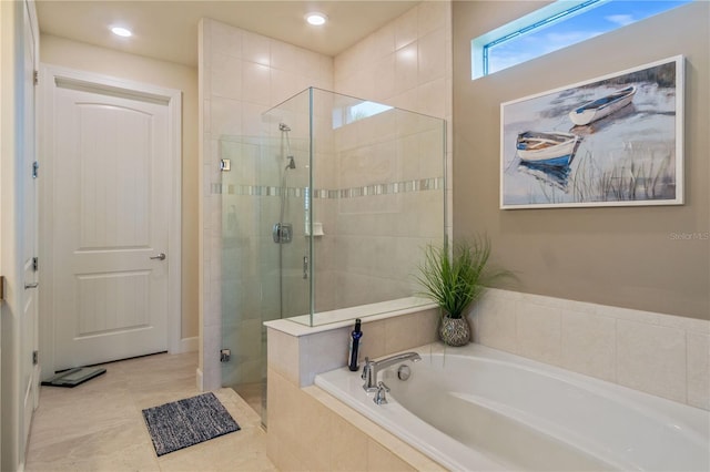 1745 Hyssop Loop, North Port, FL 34289 - bathroom featuring a shower stall, a bath, and recessed lighting
