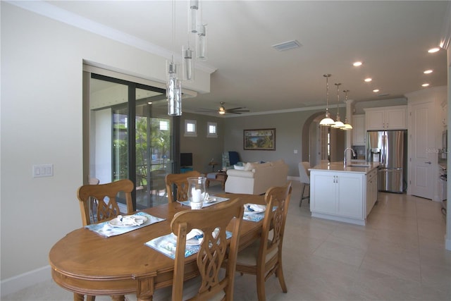 1745 Hyssop Loop, North Port, FL 34289 - dining space with ornamental molding, recessed lighting, a ceiling fan, and light tile patterned flooring