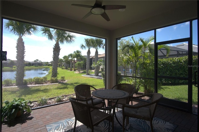1745 Hyssop Loop, North Port, FL 34289 - sunroom with a water view, a ceiling fan, and brick flooring