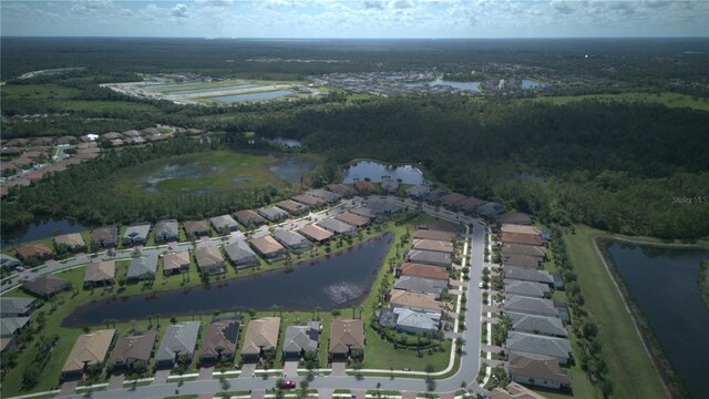 1745 Hyssop Loop, North Port, FL 34289 - aerial view of property and surrounding area with nearby suburban area and a nearby body of water