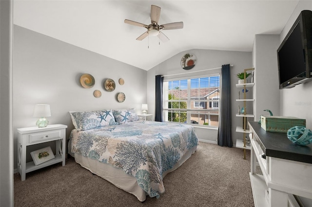 carpeted bedroom with a ceiling fan, vaulted ceiling, and baseboards