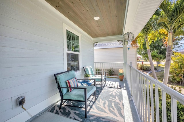 balcony featuring covered porch