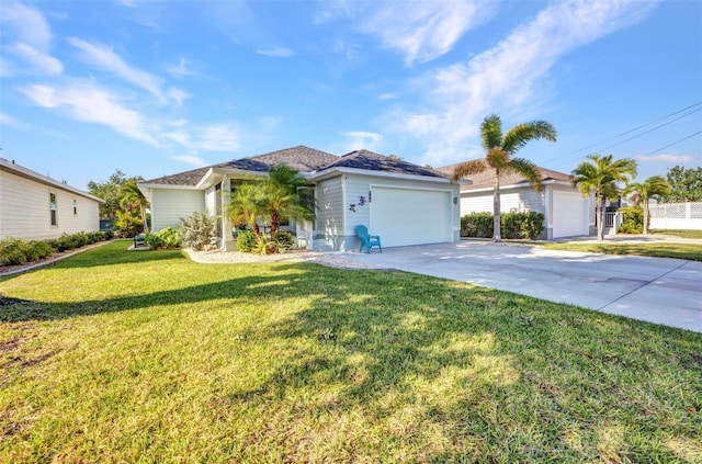 ranch-style home featuring driveway, a front lawn, and an attached garage