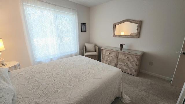 21300 Brinson Ave Unit 201, Port Charlotte, FL 33952 - carpeted bedroom with baseboards