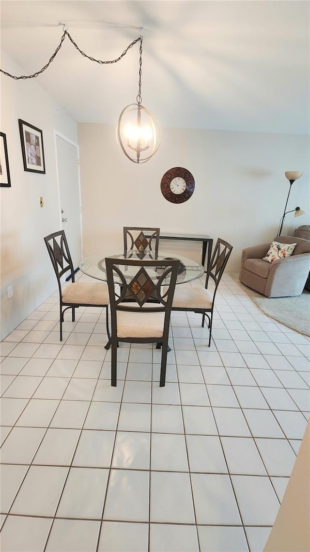 21300 Brinson Ave Unit 201, Port Charlotte, FL 33952 - dining room with light tile patterned floors