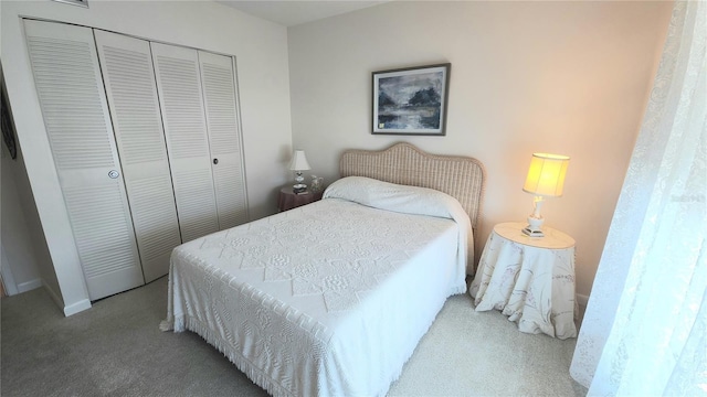 21300 Brinson Ave Unit 201, Port Charlotte, FL 33952 - carpeted bedroom featuring baseboards and a closet