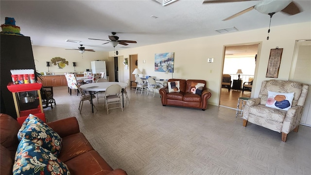21300 Brinson Ave Unit 201, Port Charlotte, FL 33952 - living room with a ceiling fan and visible vents