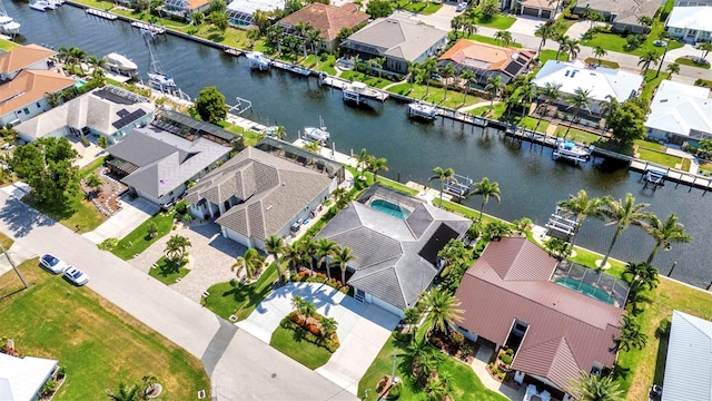 80 Hibiscus Dr, Punta Gorda, FL 33950 - aerial perspective of suburban area featuring a nearby body of water