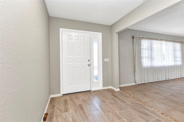 80 Hibiscus Dr, Punta Gorda, FL 33950 - entrance foyer featuring a textured wall and baseboards