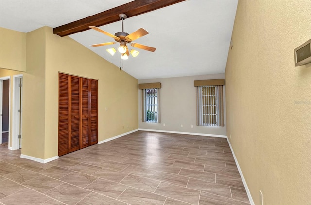 80 Hibiscus Dr, Punta Gorda, FL 33950 - unfurnished bedroom with beamed ceiling, a textured wall, a closet, a ceiling fan, and baseboards