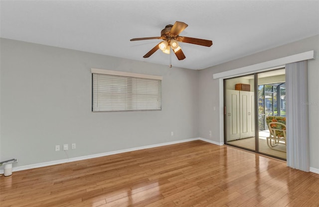 80 Hibiscus Dr, Punta Gorda, FL 33950 - spare room with wood finished floors, a ceiling fan, and baseboards