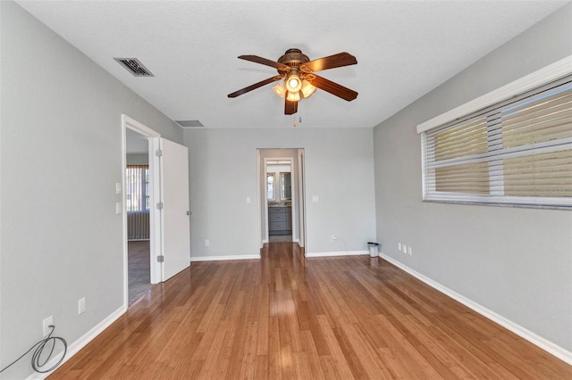 80 Hibiscus Dr, Punta Gorda, FL 33950 - spare room with a ceiling fan, wood finished floors, and baseboards