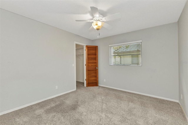 80 Hibiscus Dr, Punta Gorda, FL 33950 - unfurnished bedroom featuring carpet, a spacious closet, baseboards, and a closet