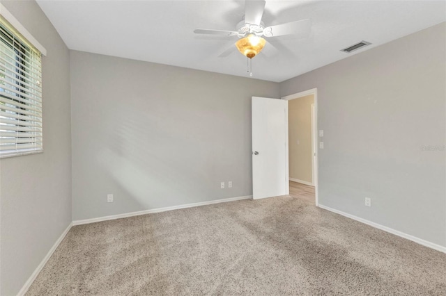80 Hibiscus Dr, Punta Gorda, FL 33950 - carpeted empty room with a ceiling fan and baseboards