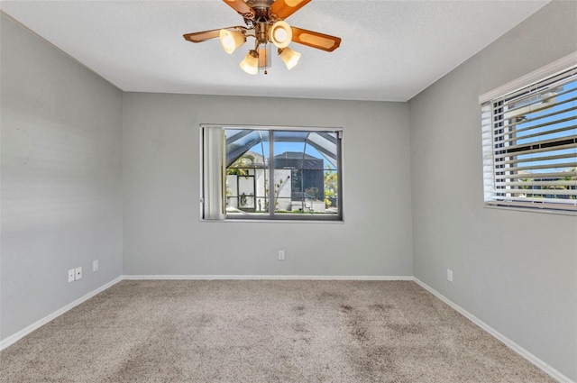 80 Hibiscus Dr, Punta Gorda, FL 33950 - carpeted empty room featuring ceiling fan and baseboards