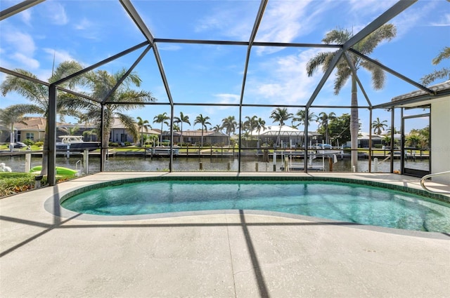 80 Hibiscus Dr, Punta Gorda, FL 33950 - view of swimming pool with a water view, a patio, and glass enclosure