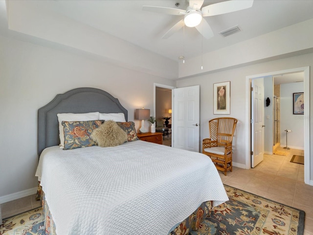 bedroom featuring light tile patterned floors, a ceiling fan, visible vents, and baseboards