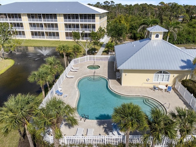 pool featuring a patio and a fenced backyard