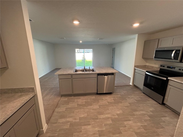 11 Zorro Ct, Palm Coast, FL 32164 - kitchen with a sink, gray cabinets, appliances with stainless steel finishes, and light countertops