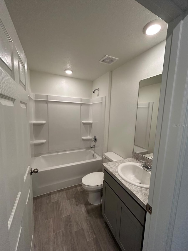 11 Zorro Ct, Palm Coast, FL 32164 - full bathroom featuring vanity, toilet, recessed lighting, tub / shower combination, and wood finished floors