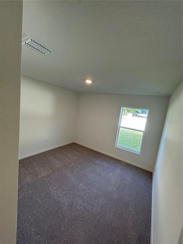11 Zorro Ct, Palm Coast, FL 32164 - empty room with recessed lighting, baseboards, visible vents, and dark colored carpet