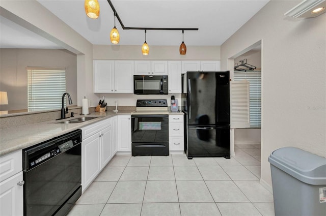 kitchen featuring a sink, white cabinetry, black appliances, and light countertops