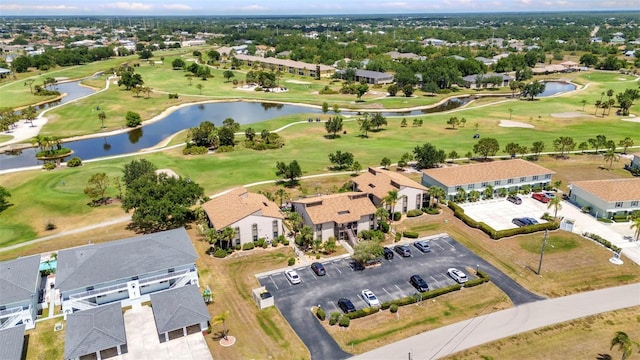 bird's eye view featuring a water view, a residential view, and golf course view