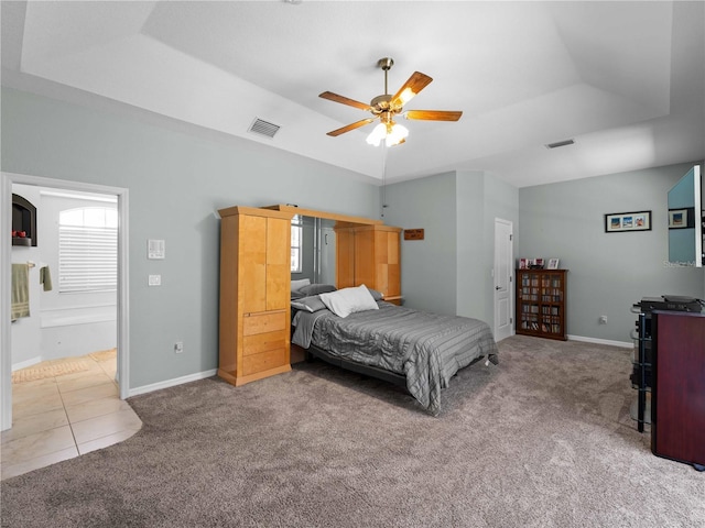 2288 Prague Ln, Punta Gorda, FL 33983 - bedroom featuring carpet flooring, a tray ceiling, and visible vents