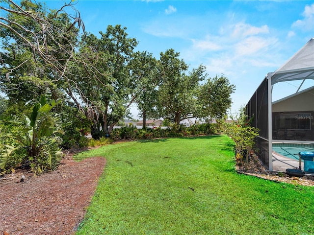 2288 Prague Ln, Punta Gorda, FL 33983 - view of yard with a lanai and an outdoor pool