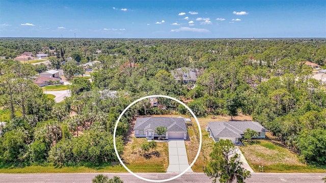 4129 Palisades Ave, North Port, FL 34287 - bird's eye view featuring a forest view