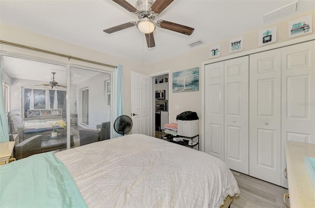 4129 Palisades Ave, North Port, FL 34287 - bedroom featuring light wood-type flooring, a ceiling fan, visible vents, and a closet