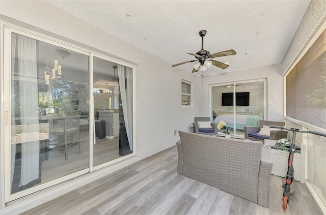 4129 Palisades Ave, North Port, FL 34287 - sunroom with ceiling fan and outdoor lounge area