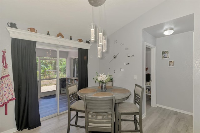 4129 Palisades Ave, North Port, FL 34287 - dining space featuring baseboards and light wood finished floors